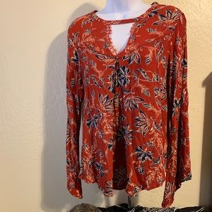 Crimson red long sleeve v-neck with paisley print
